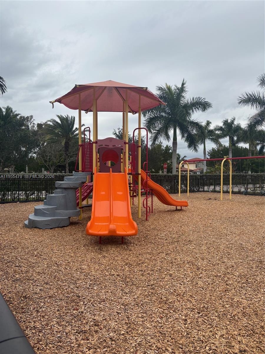 15062 Southwest 177th Terrace Miami, FL 33187 - Photo 11 of 41 a view of a park with slide