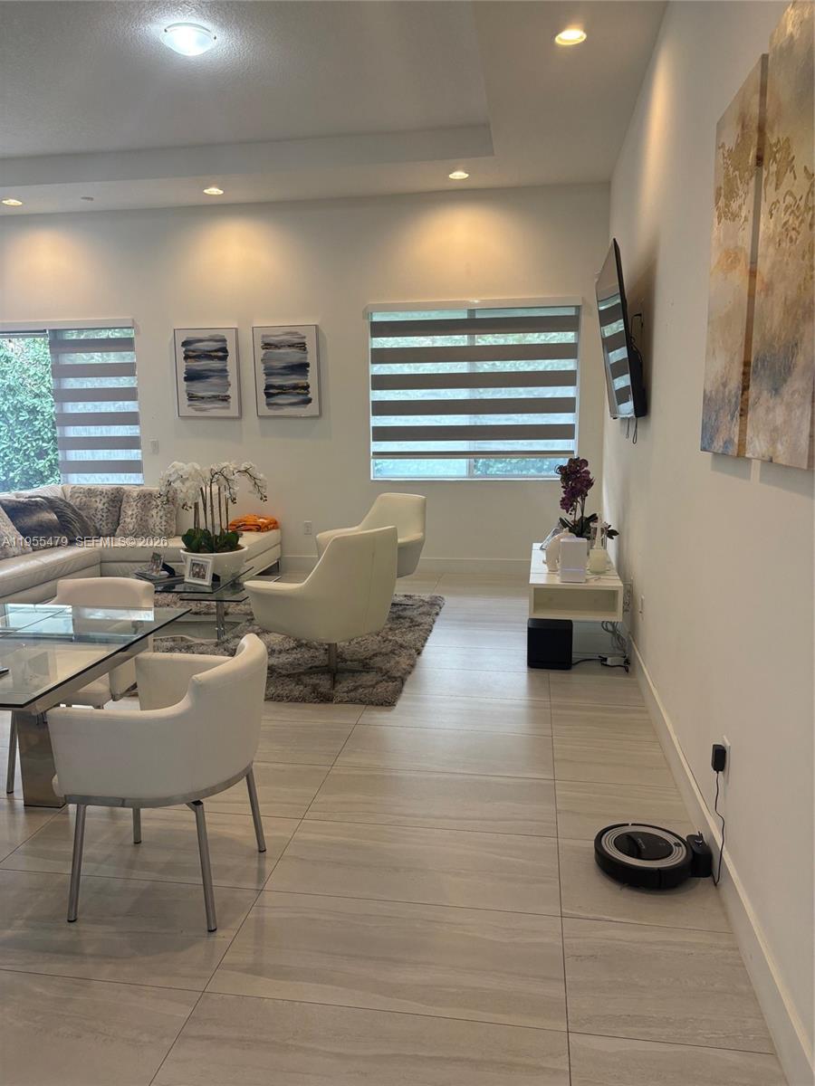 15062 Southwest 177th Terrace Miami, FL 33187 - Photo 17 of 41 a living room with furniture