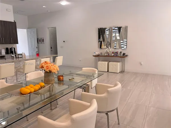 a bedroom with a bed and chair