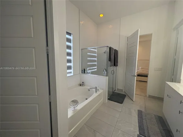 a view of a room with white walls