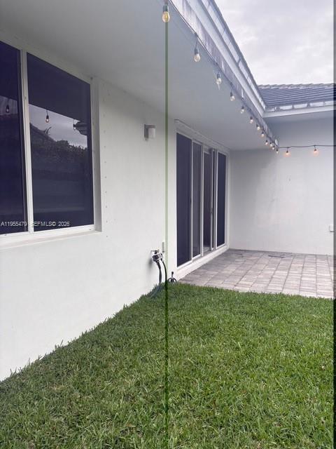 15062 Southwest 177th Terrace Miami, FL 33187 - Photo 40 of 41 a view of a backyard