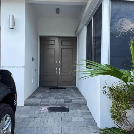 a view of lake with palm trees