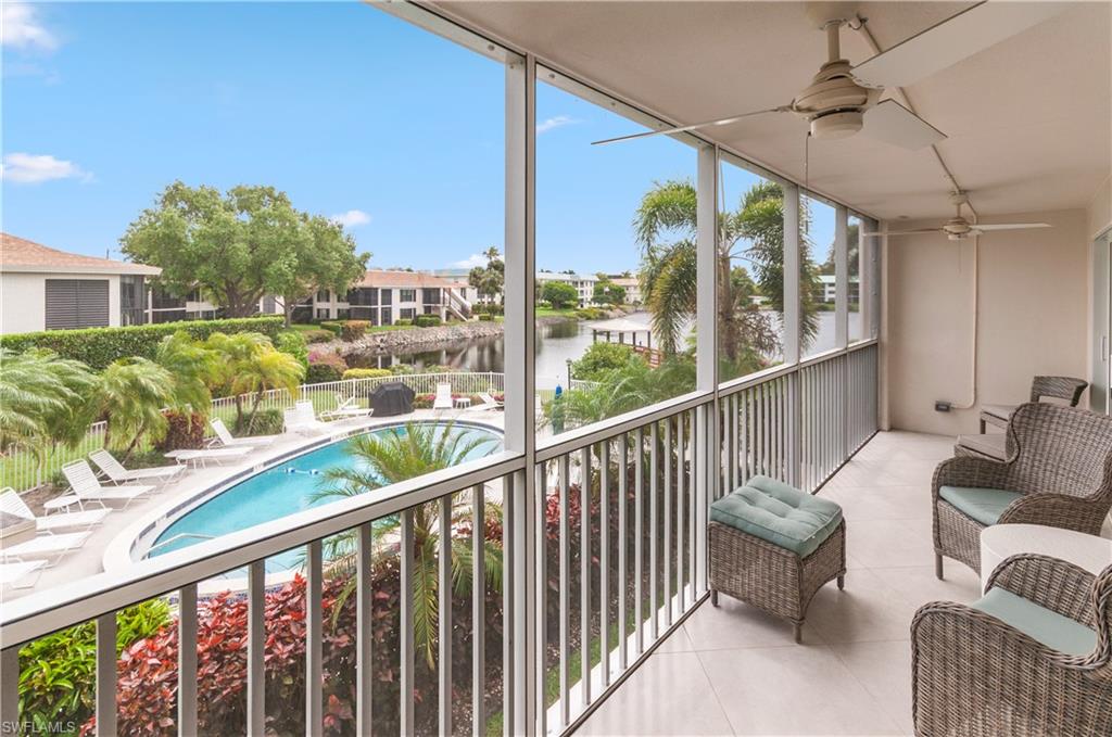 3150 Binnacle Drive, Unit 209 2J Naples, FL 34103 - Photo 20 of 32 a view of balcony with furniture