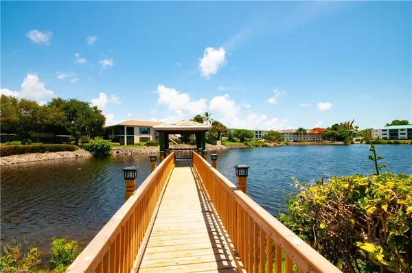 a view of swimming pool with a lake view