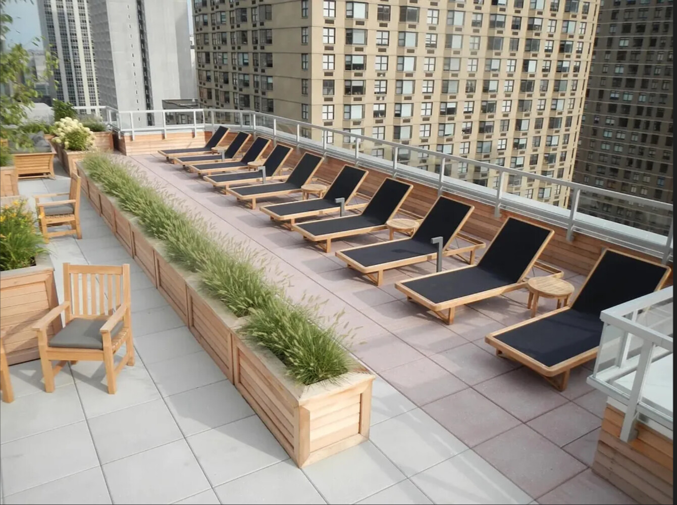 360 East 72nd Street, Unit C3301 Manhattan, NY 10021 - Photo 20 of 27 a view of swimming pool with outdoor seating