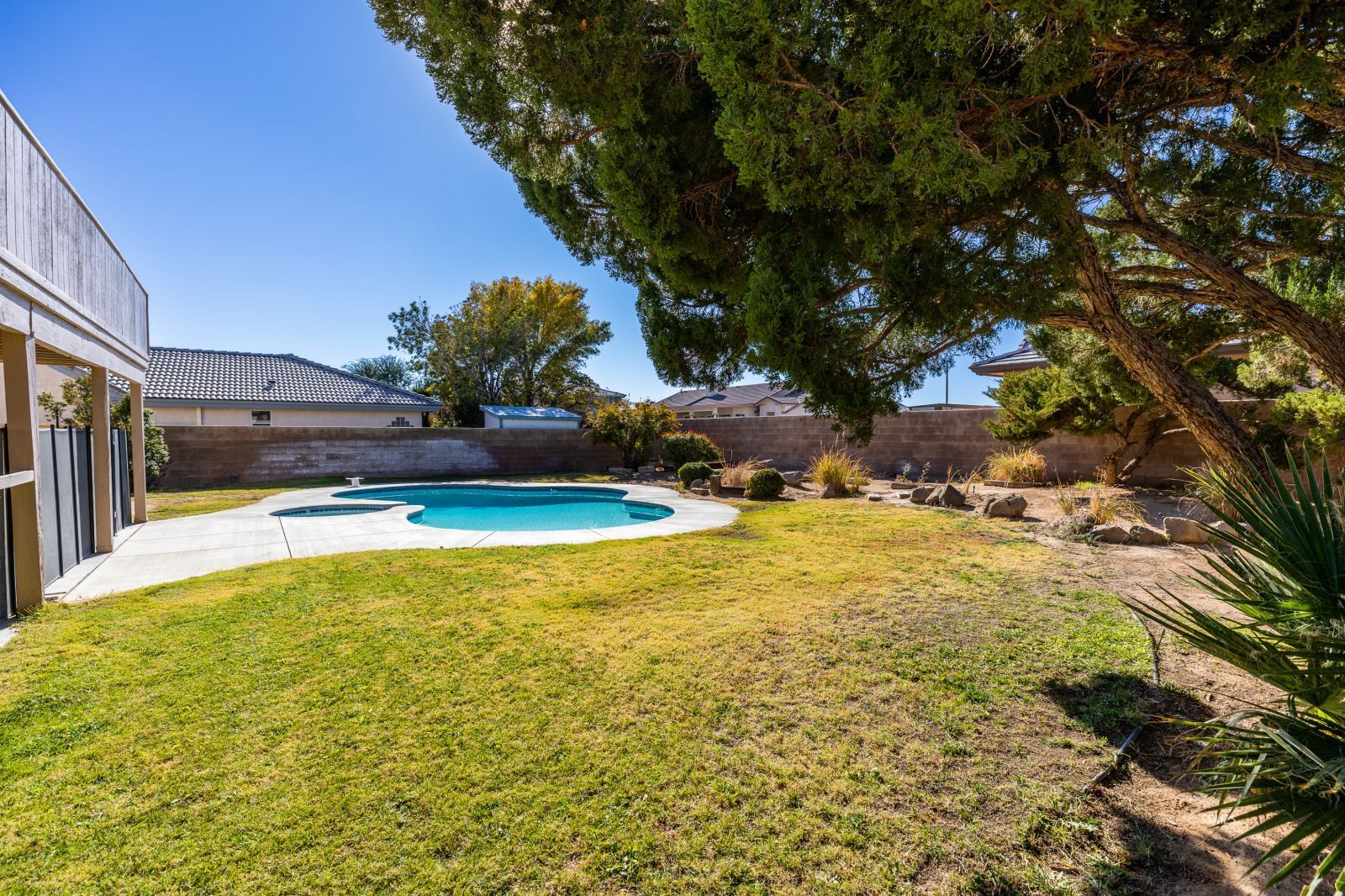 1047 Carolyn Street Ridgecrest, CA 93555 - Photo 32 of 35 a view of swimming pool with an outdoor space and seating area