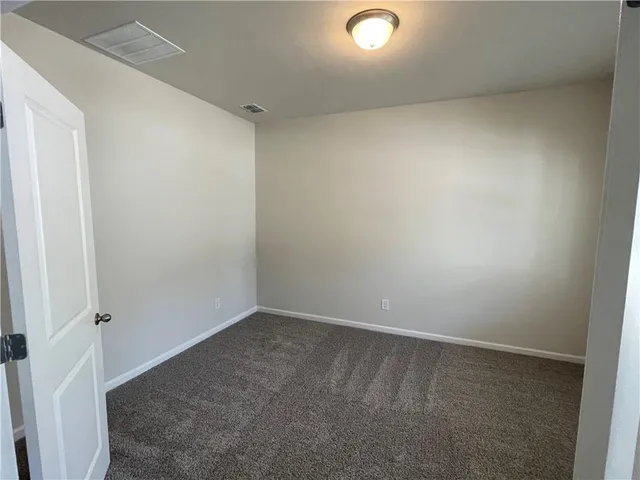 an empty room with a workbench