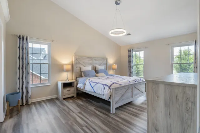 a bed room with a bed and furniture