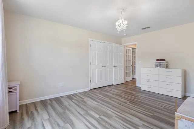 a bathroom with a sink vanity and a mirror