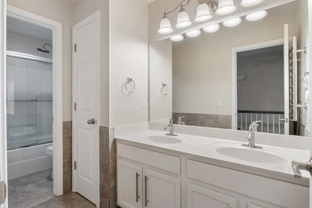 a room with furniture and a chandelier