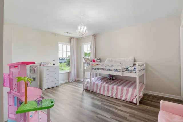 a utility room with sink dryer and washer