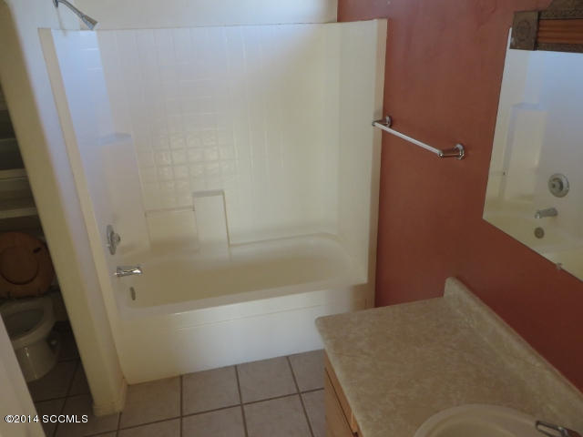 1255 Avenida Gloriosa Rio Rico, AZ 85648 - Photo 27 of 33 a bathroom with a bathtub