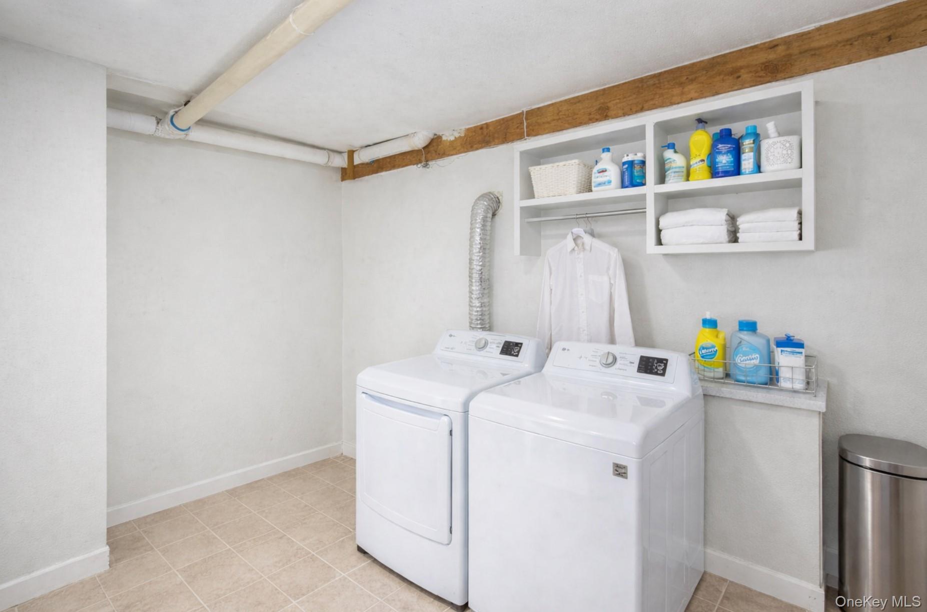 50 Poseidon Road Rocky Point, NY 11778 - Photo 31 of 47 a utility room with dryer and washer
