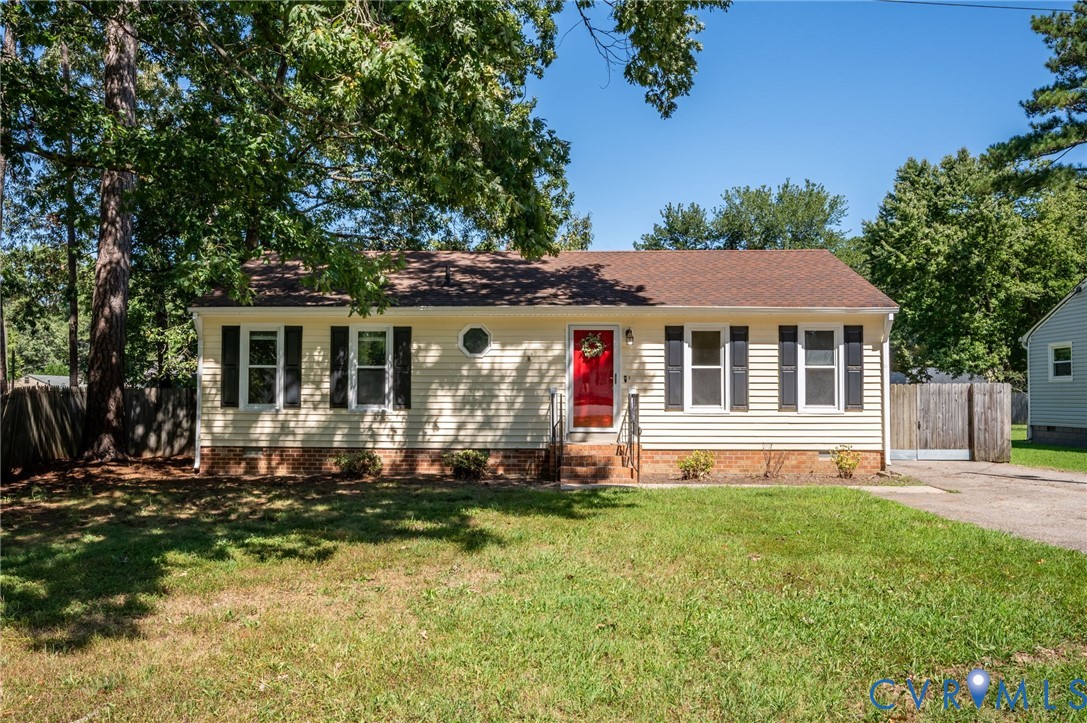 3530 Glisson Road Richmond, VA 23237 - Photo 1 of 17 Yellow siding exterior with dark shutters, red fro