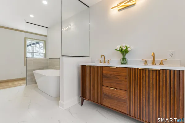 a bathroom with a sink and a bathtub