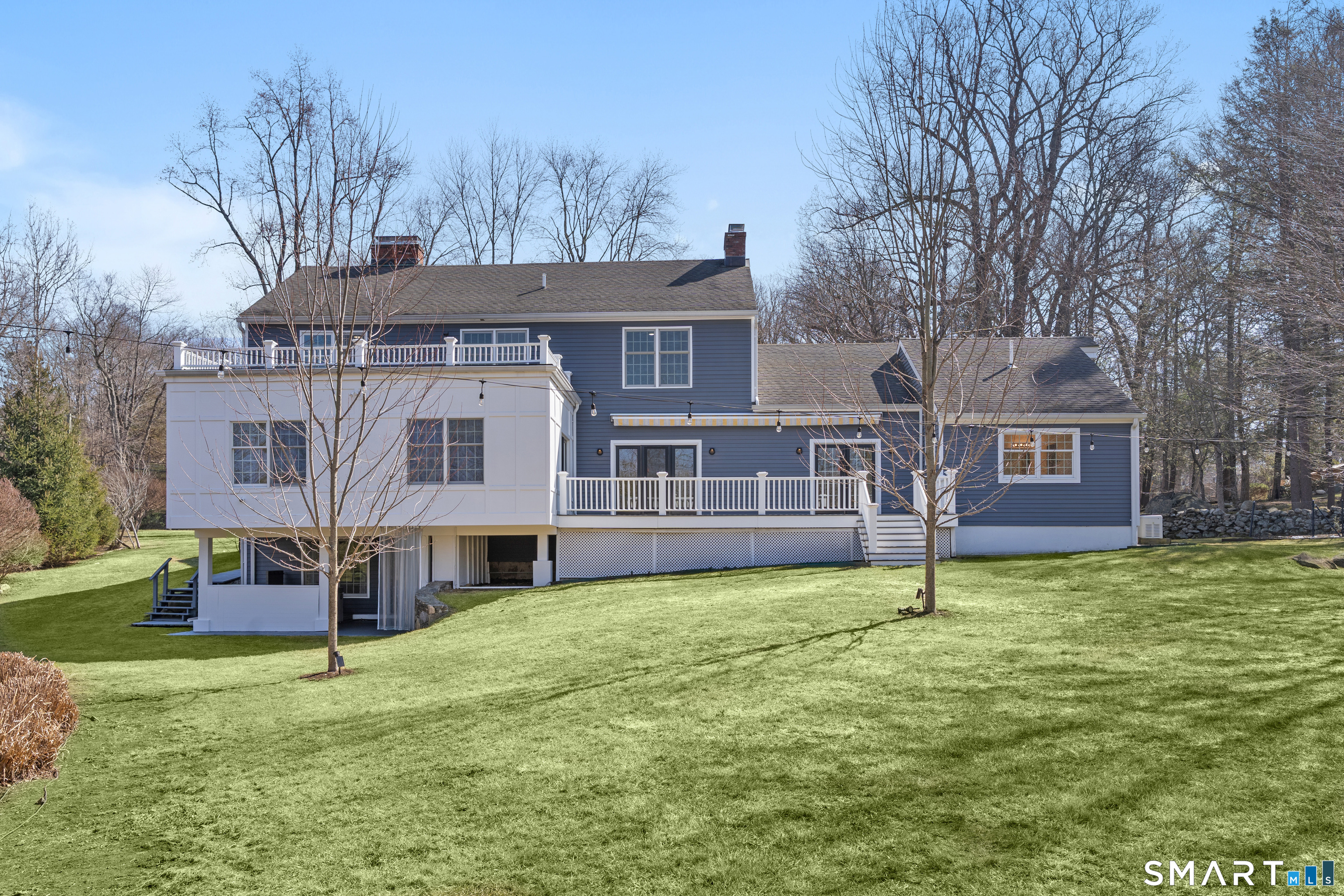 14 Windermere Lane Stamford, CT 06902 - Photo 42 of 45 a view of a house with a yard