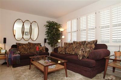 2933 Edgewater Drive Santa Rosa, CA 95407 - Photo 6 of 11 Cozy Family Room with Elegantly Tiled Fireplace and Custom Built-In Entertainment Center.