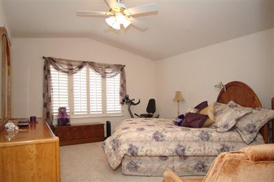 2933 Edgewater Drive Santa Rosa, CA 95407 - Photo 7 of 11 Spacious Master Bedroom Suite with Raised Ceilings and Large Walk-In Closet with Custom Organizer.