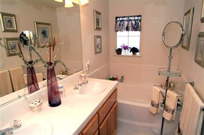 2933 Edgewater Drive Santa Rosa, CA 95407 - Photo 8 of 11 Master Bathroom with Dual Sinks, Enclosed Shower and Luxurious Soaking Tub.