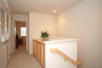 2933 Edgewater Drive Santa Rosa, CA 95407 - Photo 9 of 11 Convenient Upstairs Laundry Closet with an abundance of linen cabinets nearby.