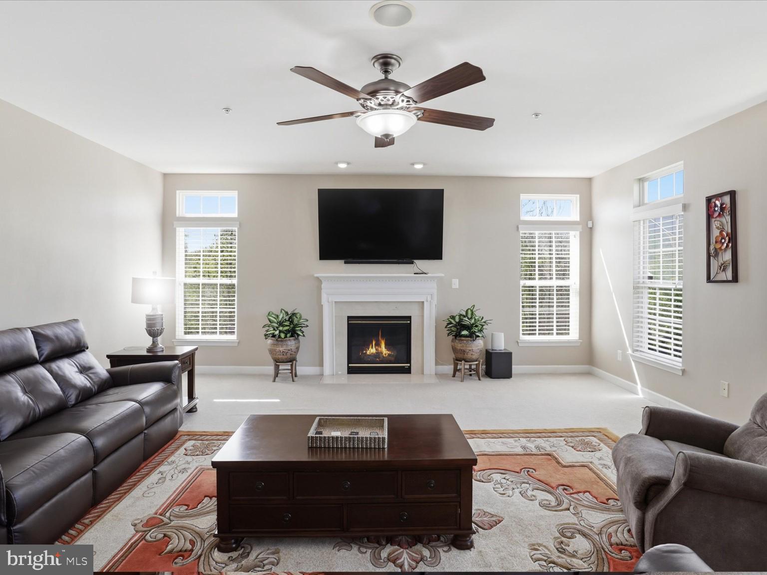 14202 Derby Ridge Road Bowie, MD 20721 - Photo 21 of 57 FAMILY ROOM WITH GAS FIREPLACE AND SIDE WINDOWS