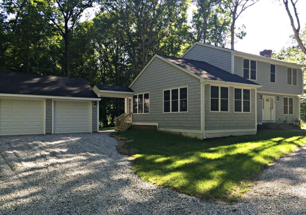 8 Pine Ridge Drive Madison, CT 06443 - Photo 1 of 1 a view of a house with a yard
