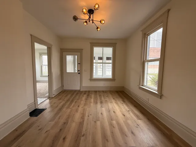 a view of an empty room and window