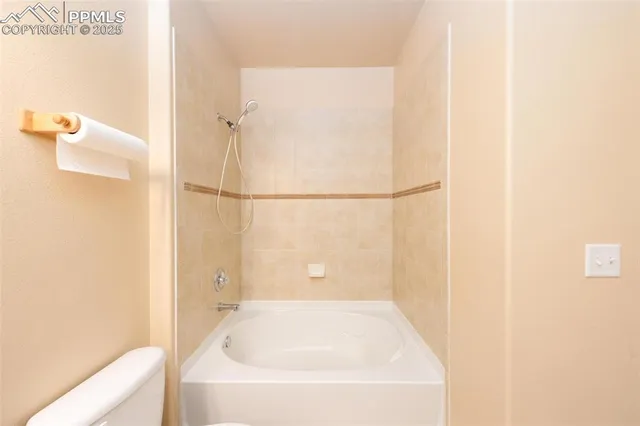 a bathroom with a sink and toilet