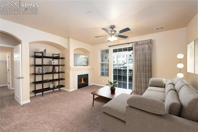 a view of kitchen and refrigerator