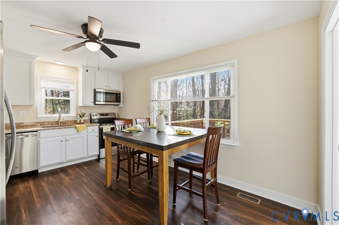 1312 Oldbury Road Midlothian, VA 23113 - Photo 13 of 35 Kitchen featuring white cabinetry, appliances with