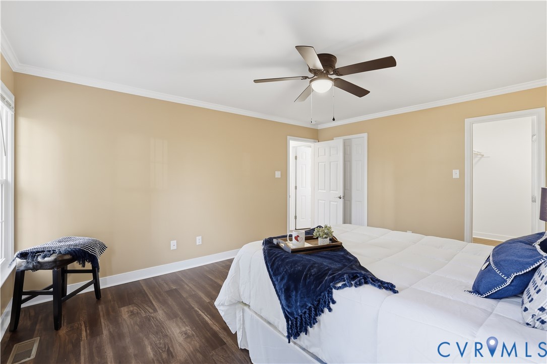 1312 Oldbury Road Midlothian, VA 23113 - Photo 20 of 35 Bedroom with crown molding, dark wood finished flo