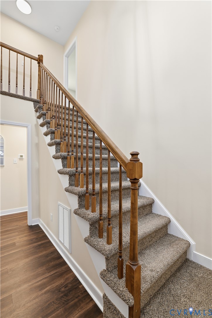 1312 Oldbury Road Midlothian, VA 23113 - Photo 24 of 35 Stairway with baseboards and wood finished floors