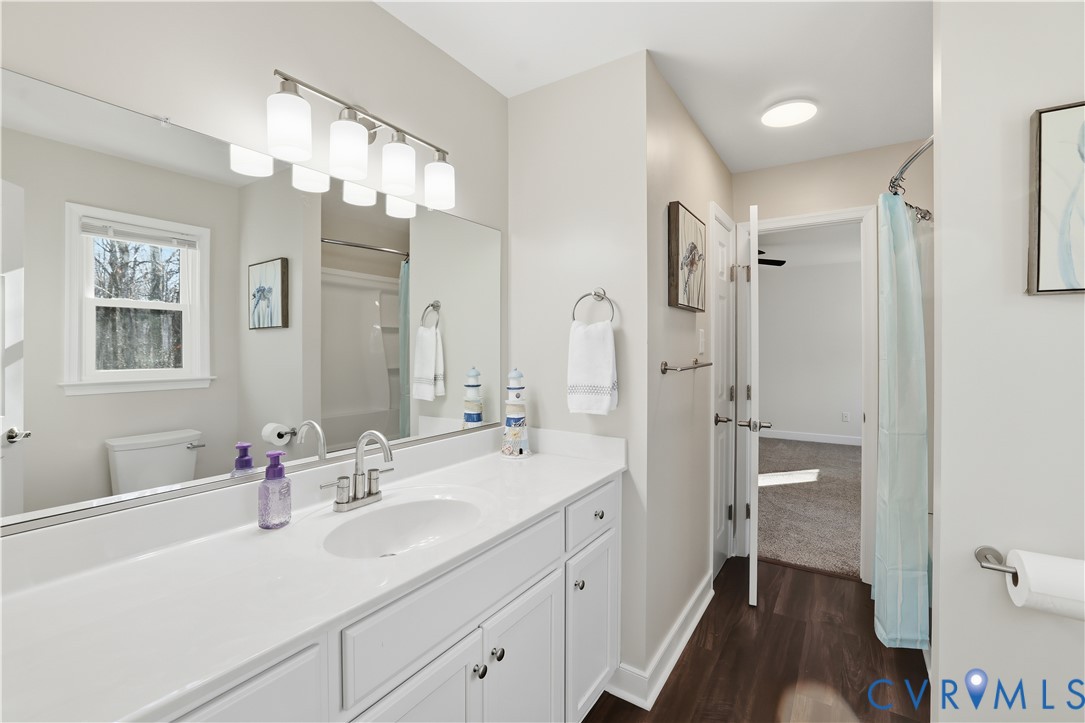 1312 Oldbury Road Midlothian, VA 23113 - Photo 27 of 35 Bathroom featuring curtained shower, vanity, and d