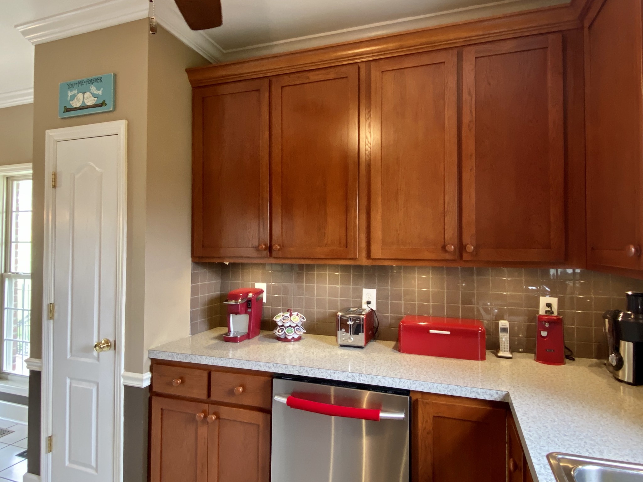 412 Ranch Road Portland, TN 37148 - Photo 11 of 35 a kitchen with a sink and cabinets