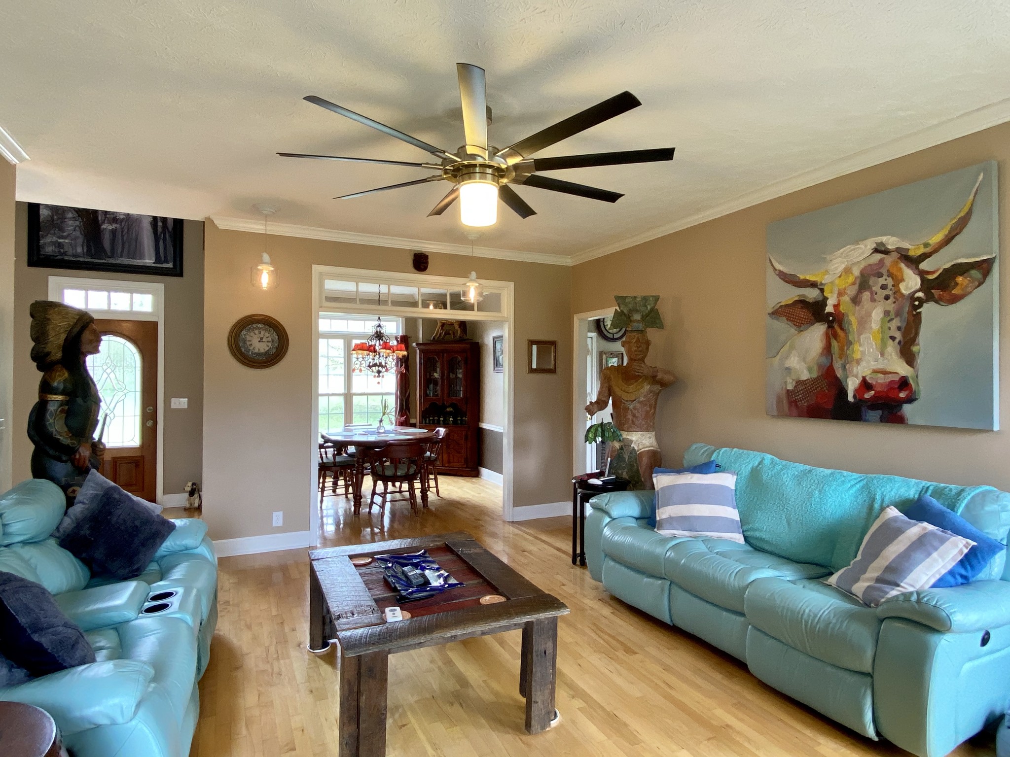 412 Ranch Road Portland, TN 37148 - Photo 14 of 35 a living room with furniture and a chandelier