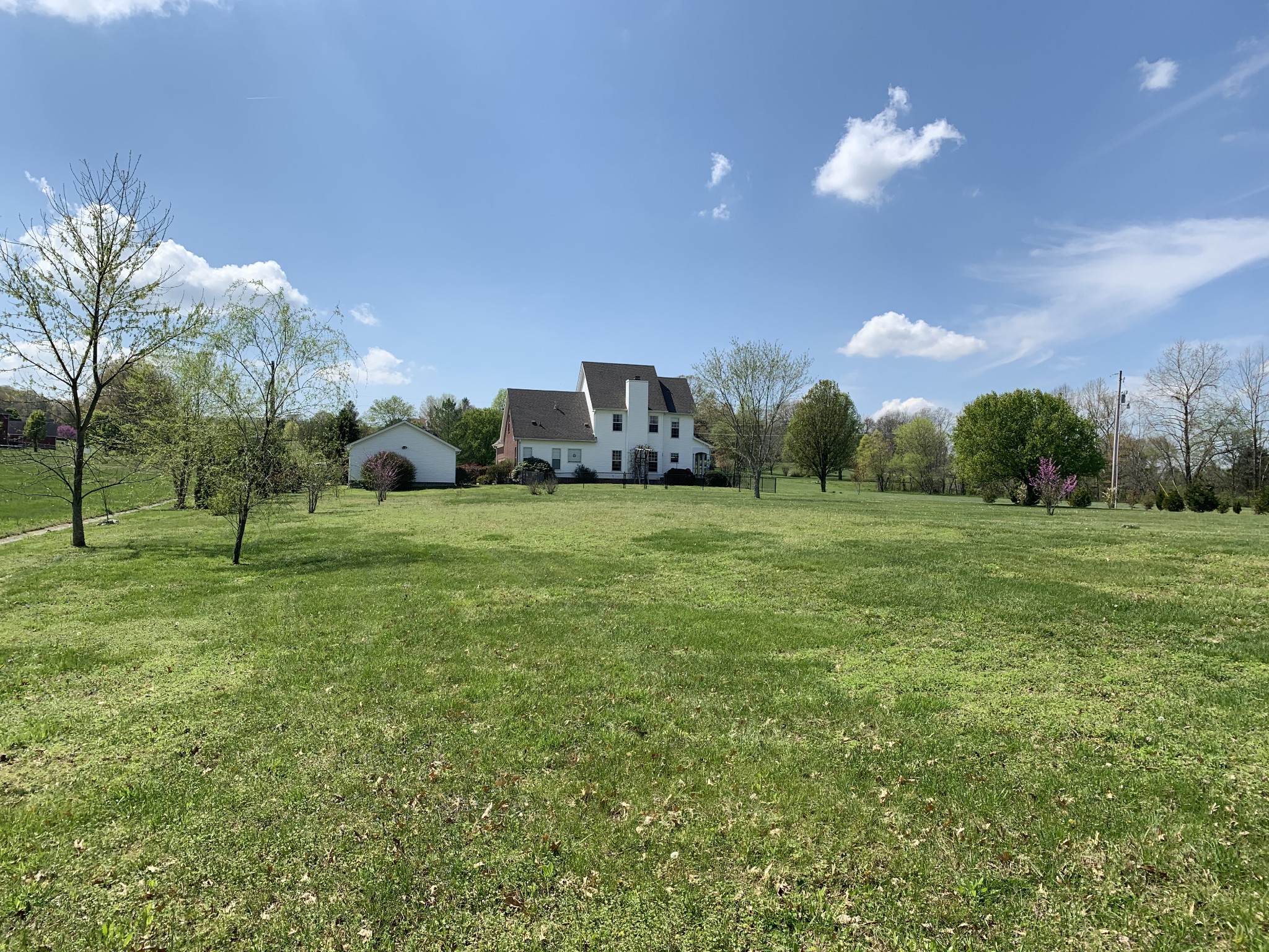 412 Ranch Road Portland, TN 37148 - Photo 29 of 35 a view of a grassy field with an trees