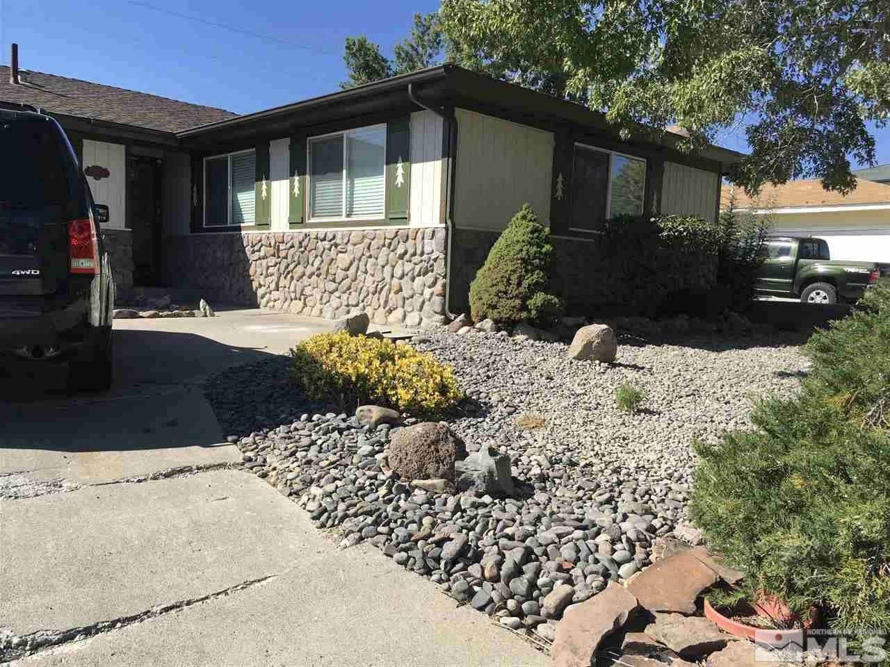 3655 Everett Drive Reno, NV 89503 - Photo 1 of 21 a front view of a house