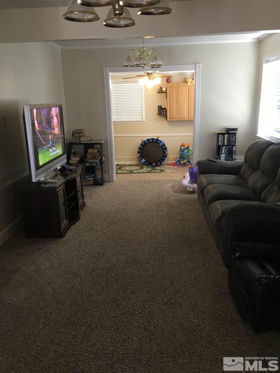 3655 Everett Drive Reno, NV 89503 - Photo 11 of 21 a living room with furniture and a flat screen tv