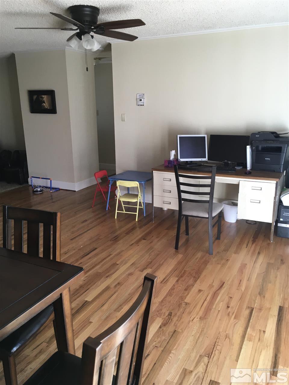 3655 Everett Drive Reno, NV 89503 - Photo 13 of 21 a reading room with wooden floor and furniture