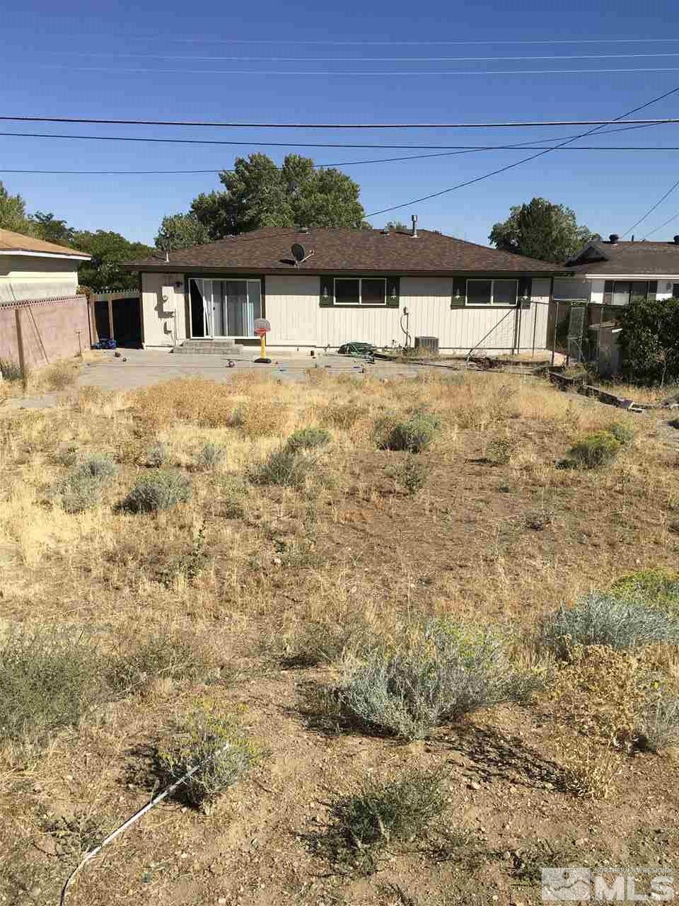3655 Everett Drive Reno, NV 89503 - Photo 19 of 21 a view of a house with a yard