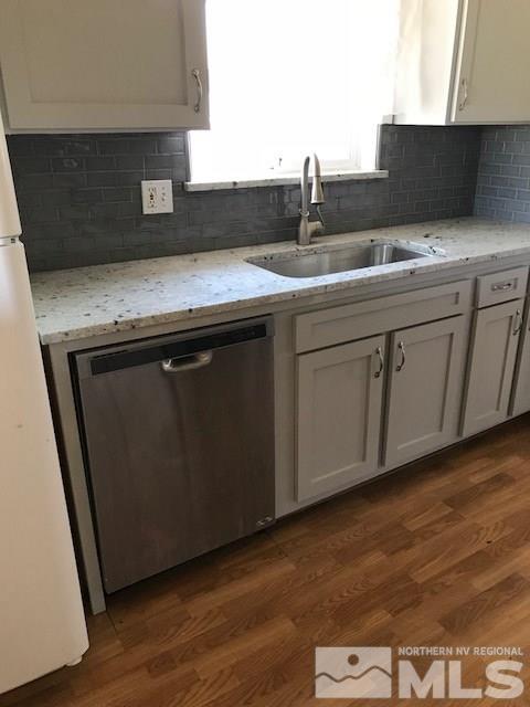 3655 Everett Drive Reno, NV 89503 - Photo 2 of 21 a kitchen with a sink and cabinets
