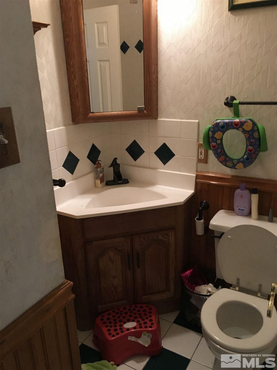 3655 Everett Drive Reno, NV 89503 - Photo 7 of 21 a bathroom with a sink and a toilet