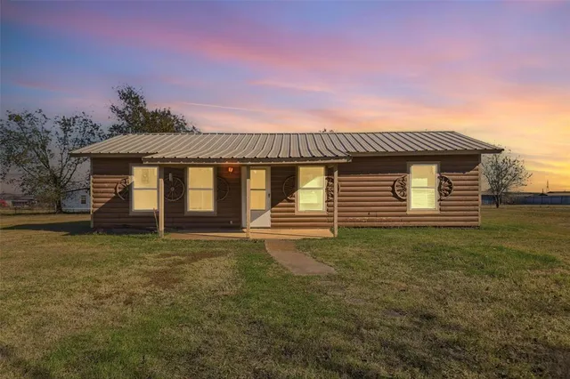 a house with garden in front of it