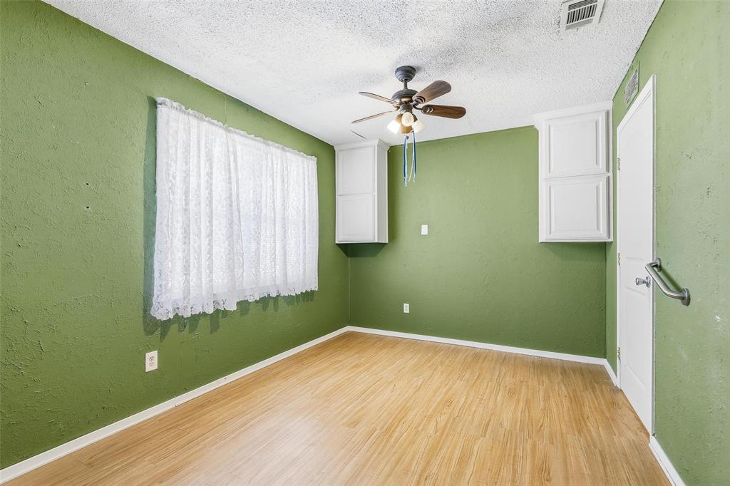 3822 Ragged Rock Court Joshua, TX 76058 - Photo 11 of 34 a view of room with window and hardwood floor