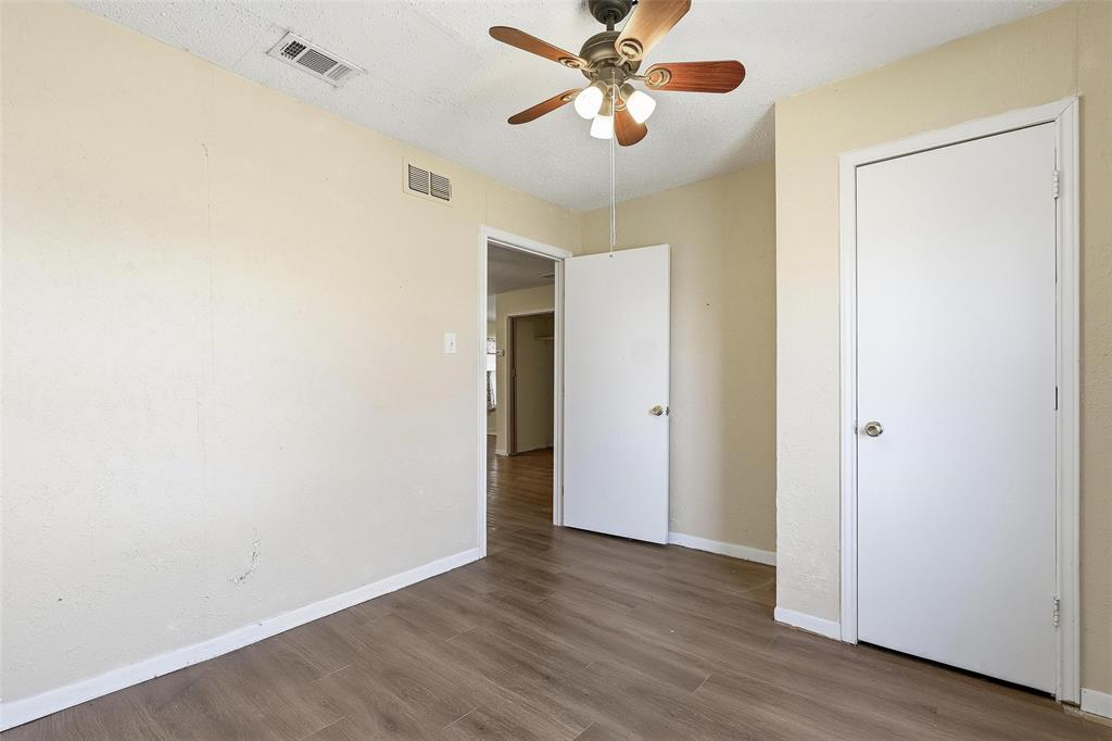 3822 Ragged Rock Court Joshua, TX 76058 - Photo 14 of 34 a view of a room with wooden floor and closet area