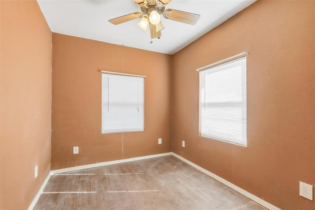 3822 Ragged Rock Court Joshua, TX 76058 - Photo 18 of 34 an empty room with a window and a chandelier fan