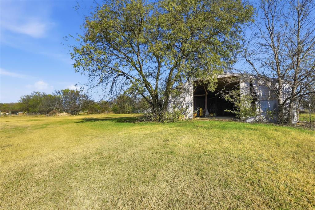 3822 Ragged Rock Court Joshua, TX 76058 - Photo 25 of 34 a view of outdoor space and yard