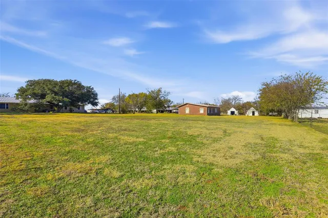 a view of yard with ocean view