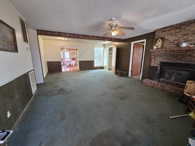 a view of a livingroom with a fireplace