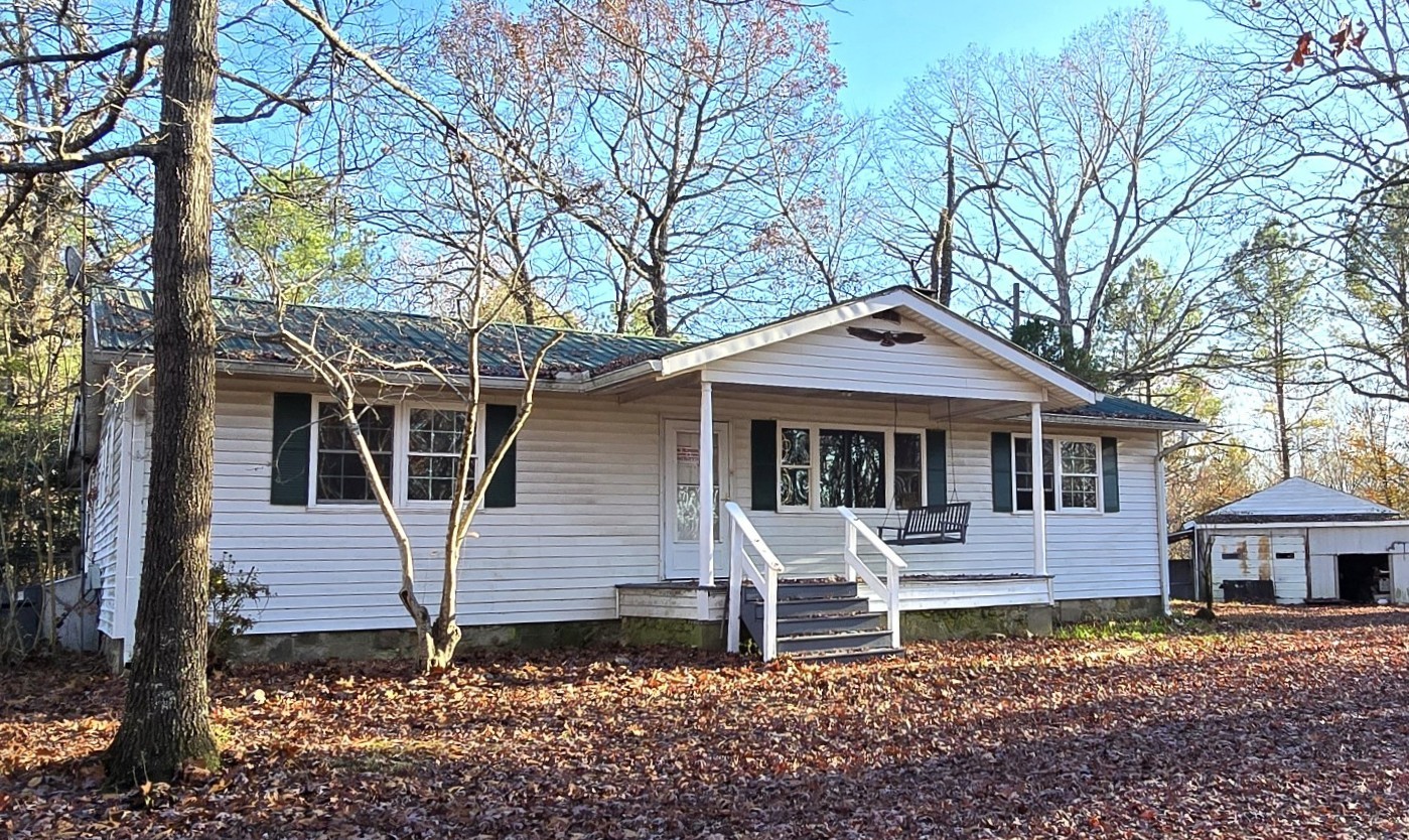 601 Anglin Ridge Road Dover, TN 37058 - Photo 6 of 29 a front view of a house with a garden